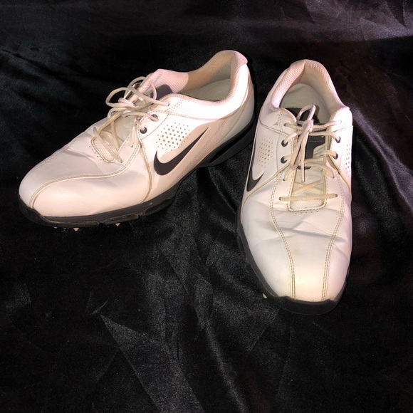 white nike shoes with black check